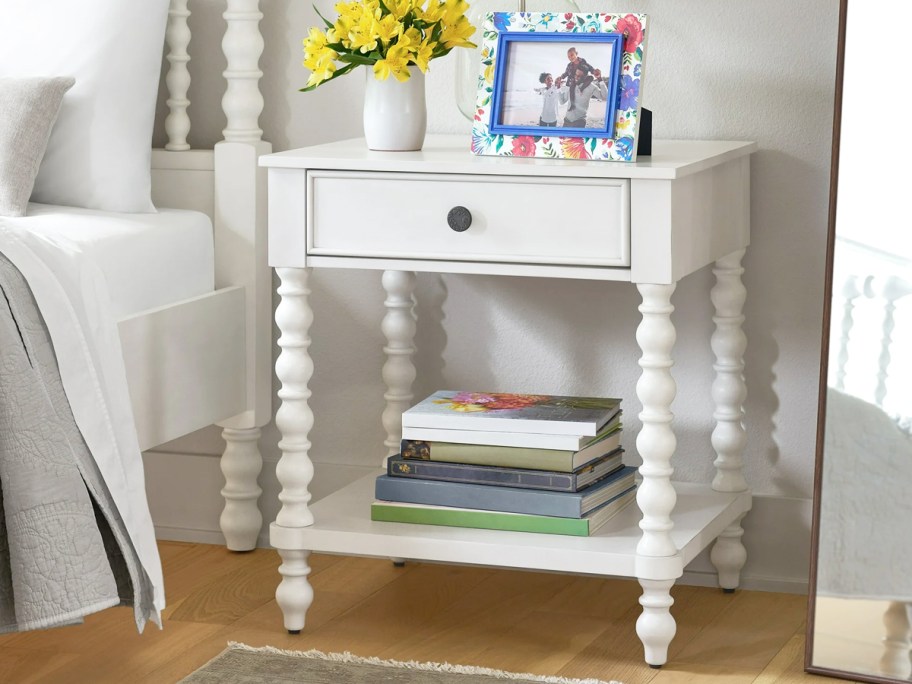 white nightstand with spindle legs