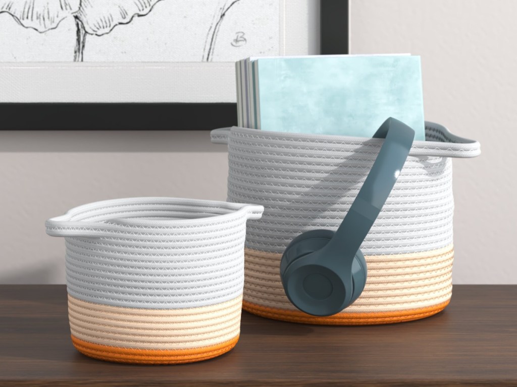 2 piece wayfair baskets with notebooks and headphone inside