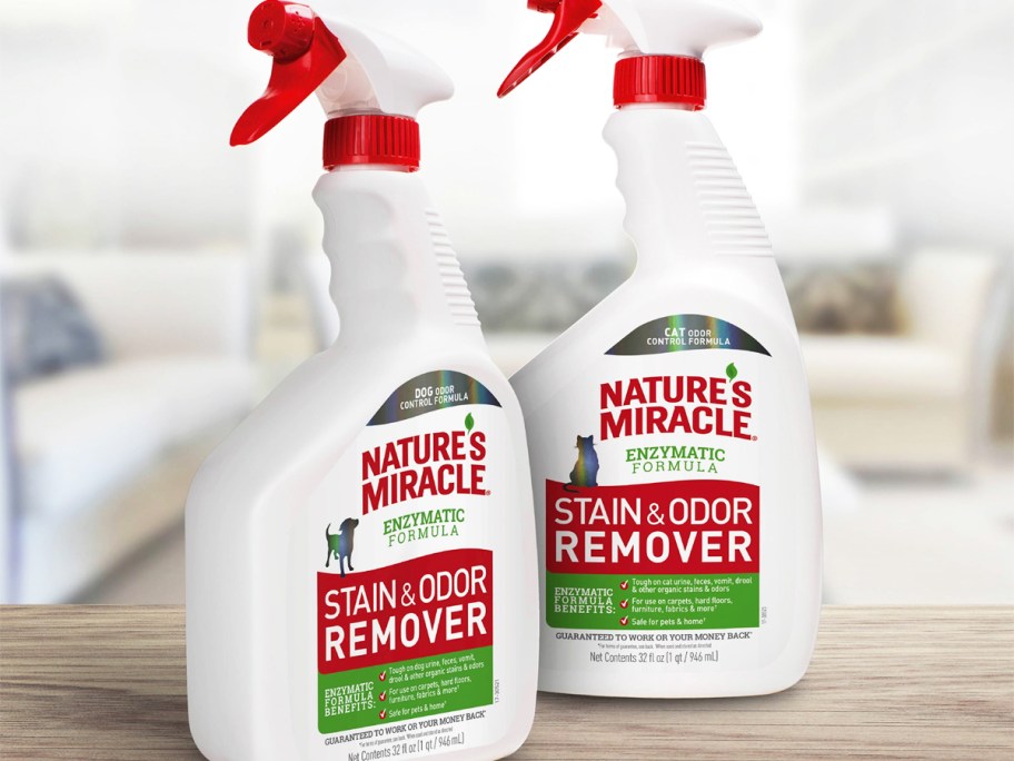 two white bottles of Nature’s Miracle Stain and Odor Remover
