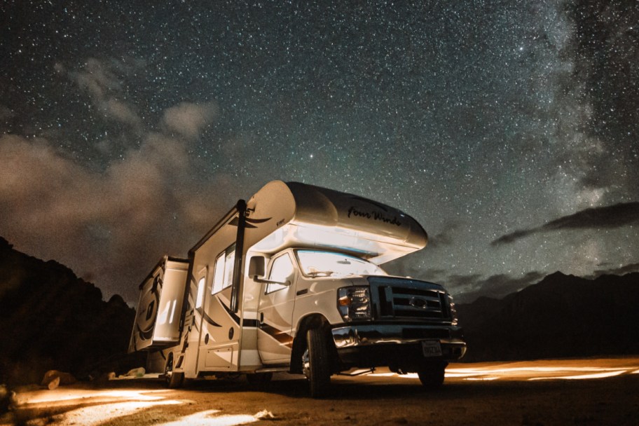 rv outside under starry sky