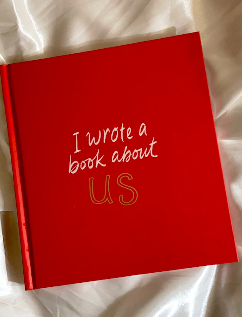red i wrote a book about us book on silk sheet