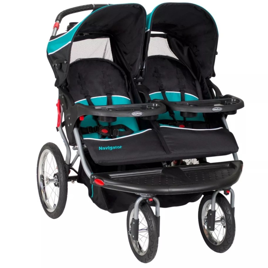 a black and teal baby double jogger stroller