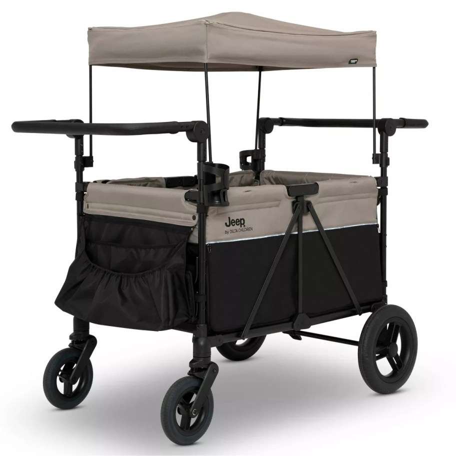 a large 4 seater baby/toddler Jeep brand stroller wagon