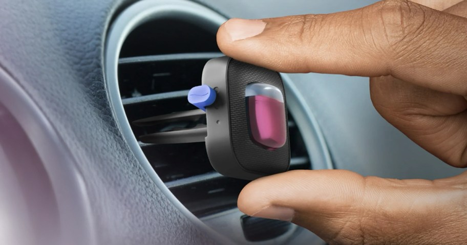 Febreze Car Island Fresh clip being used in a car
