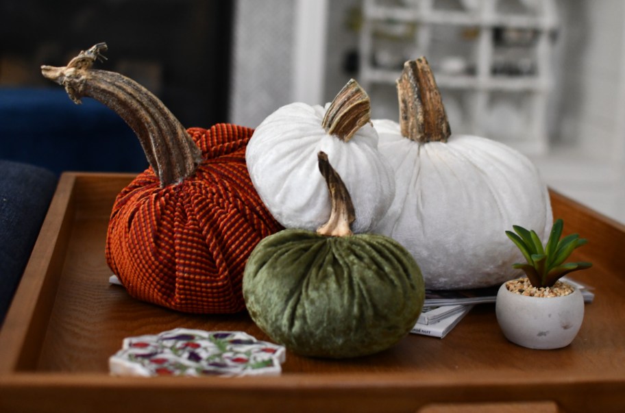 velvet pumpkins on a table as diy fall decor