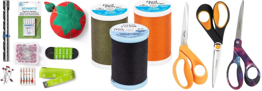various sewing supplies, thread, and scissors