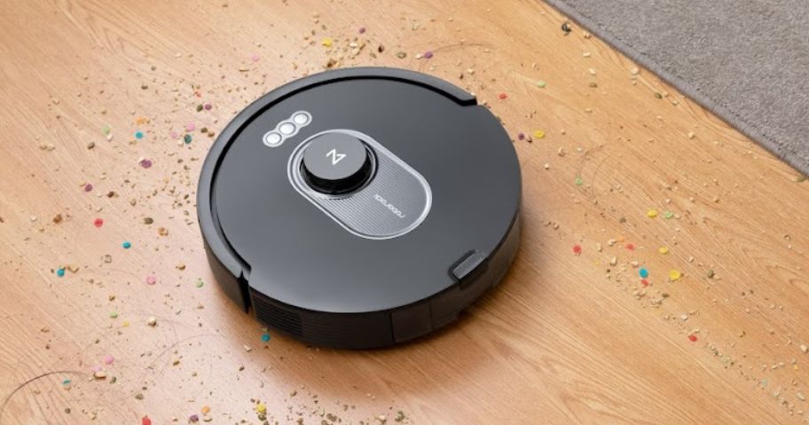 roborock robot vacuum cleaning up mess on floor