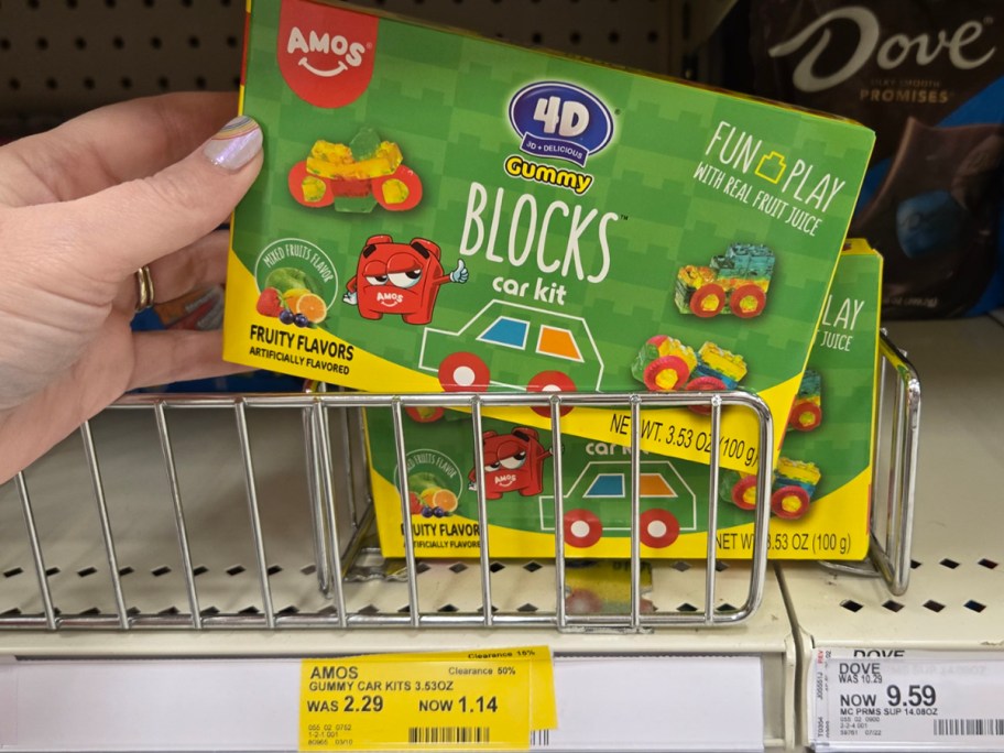 hand holding 4d gummy blocks car kit candy box 