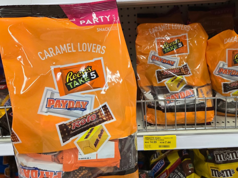 hand holding caramel lovers candy bag