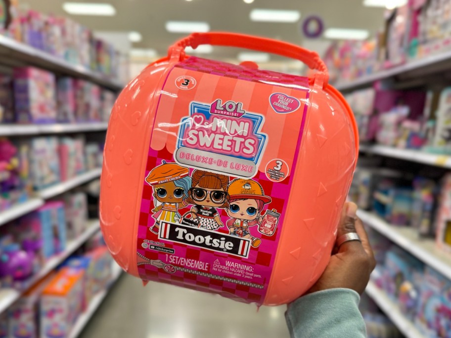 hand holding L.O.L. Surprise! Loves Mini Sweets Series 3 Deluxe - Tootsie at the store