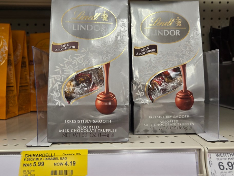 two bags of lindt truffles on shelf 