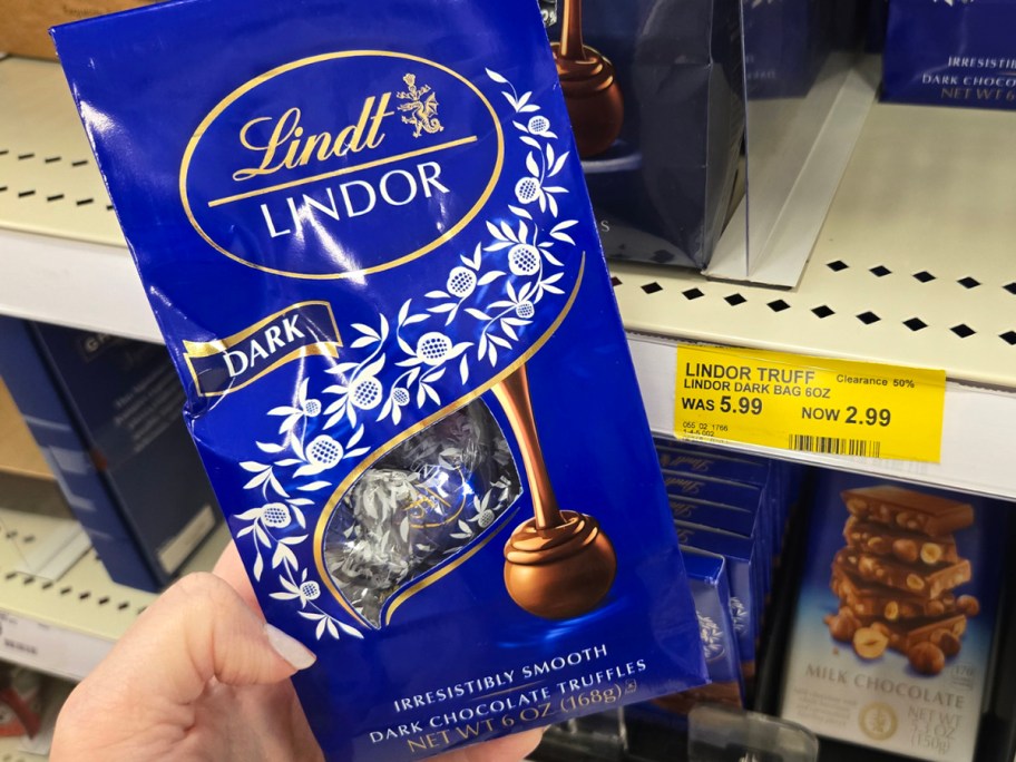 hand holding lindt chocolates bag 