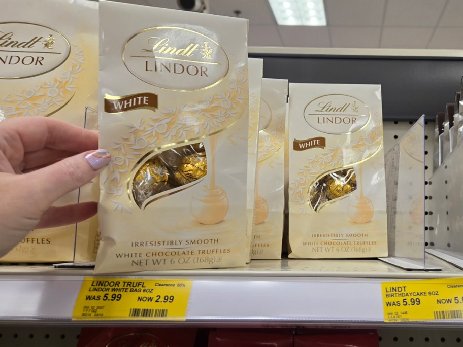 hand reaching for lindt chocolates bag