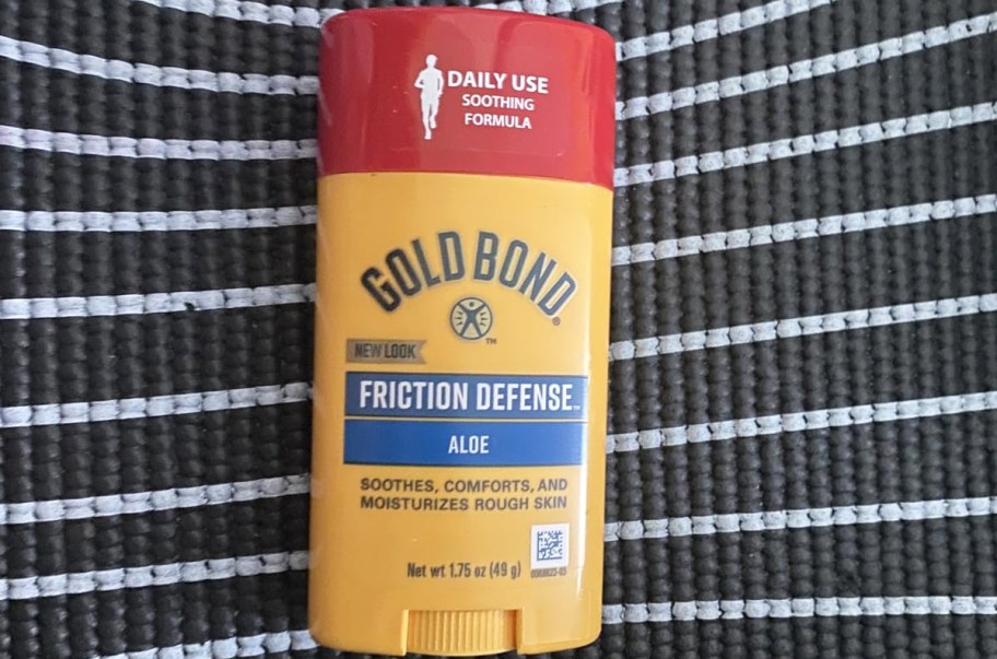 yellow and red tube of Gold Bond Friction Defense Stick