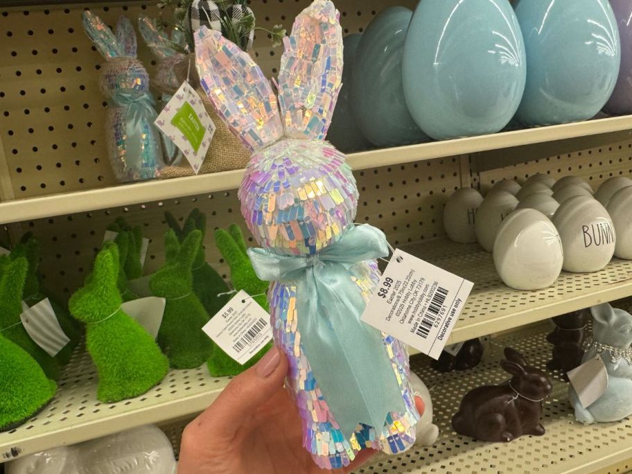 Hand holding a Iridescent Sequin Bunny from Hobby Lobby