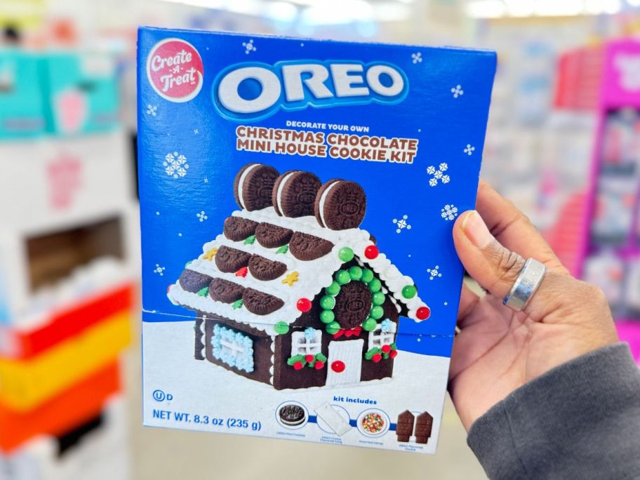 OREO Decorate Your Own Christmas Mini House Cookie Kit in hand in store