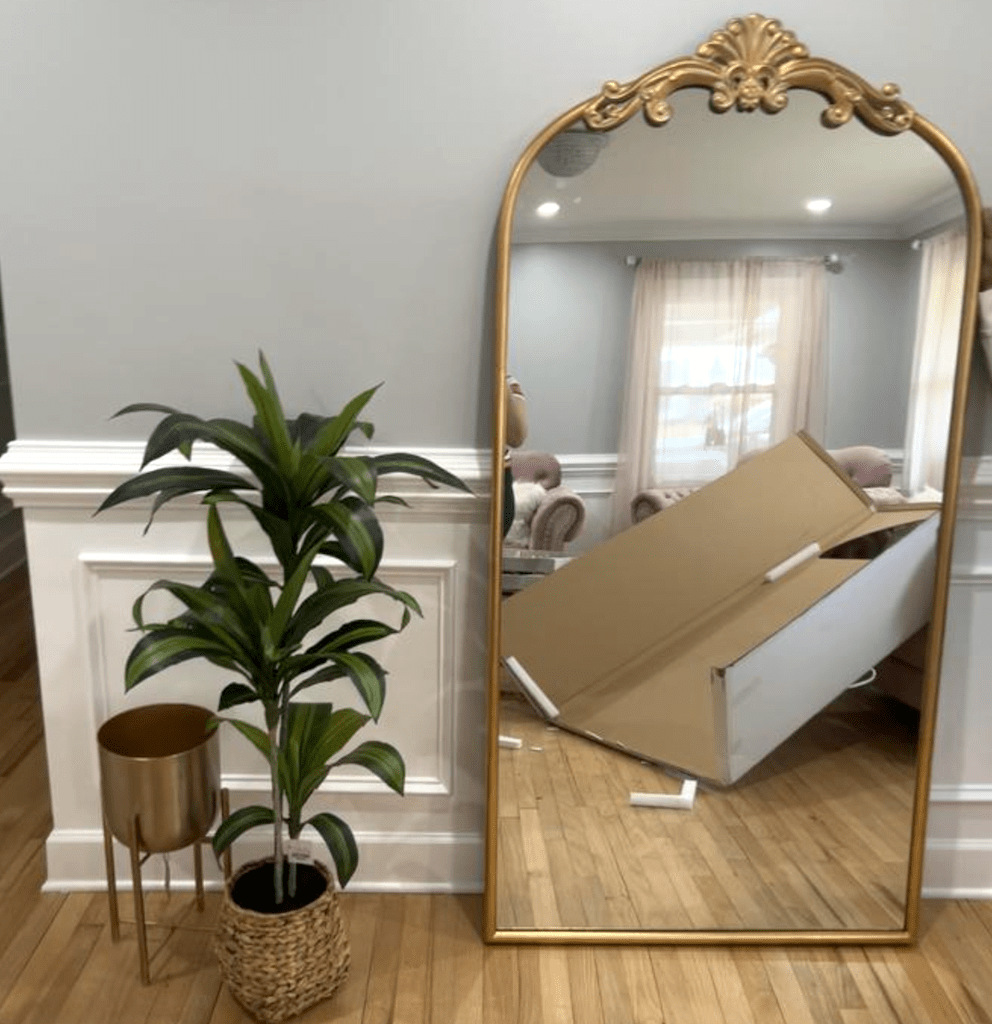 Gold mirror taken out of the box 