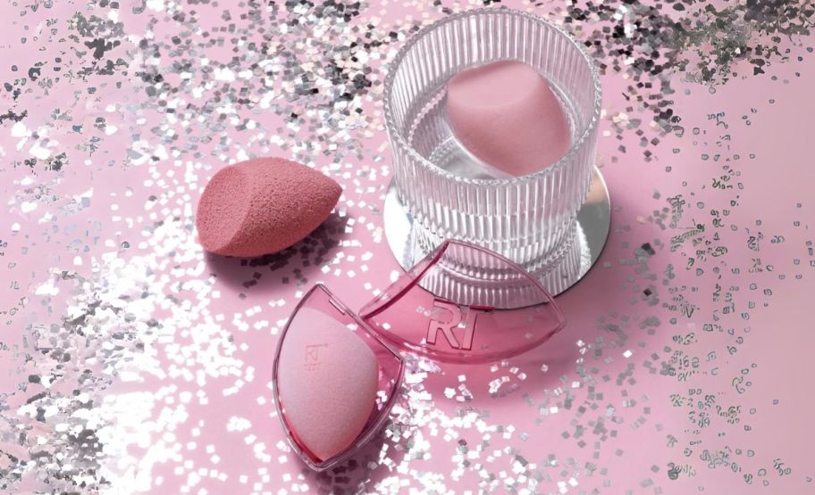 real techniques makeup sponge gift set on a tabletop shown with silver glitter 