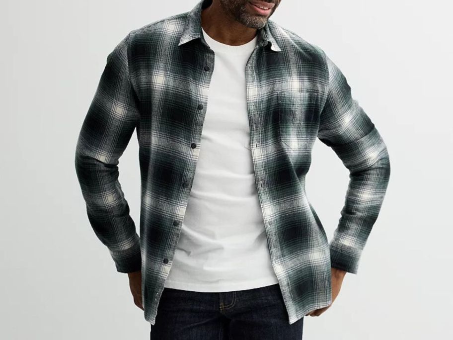A man wearing a flannel shirt