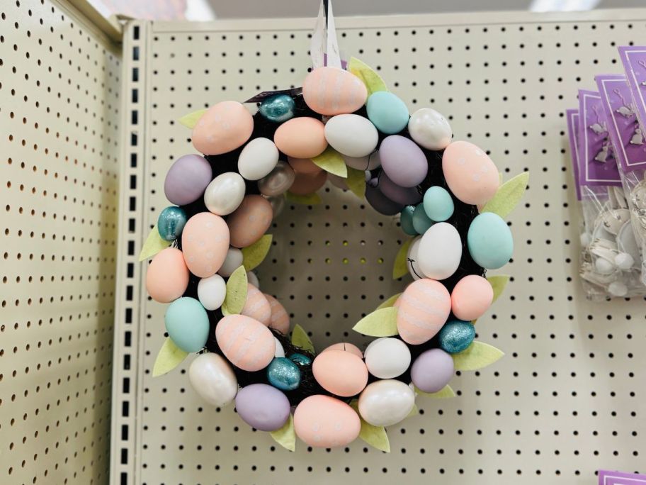 Spritz 15" Felt Floral Easter Wreath hanging in store