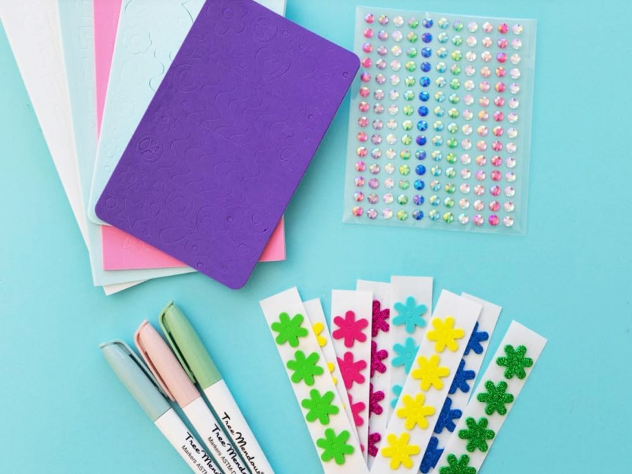 foam stickers, jewels, and markers