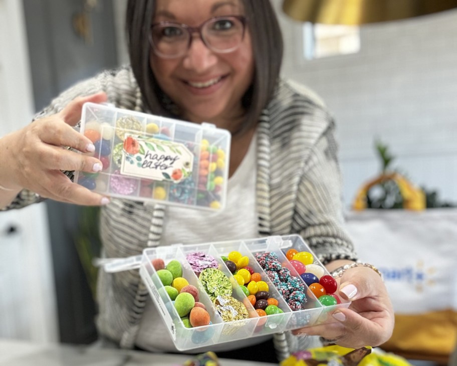woman holding open and closed easter snackle boxes