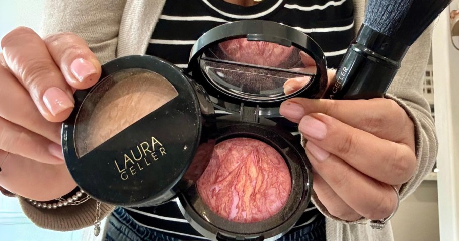 a woman holding two baked makeup compacts