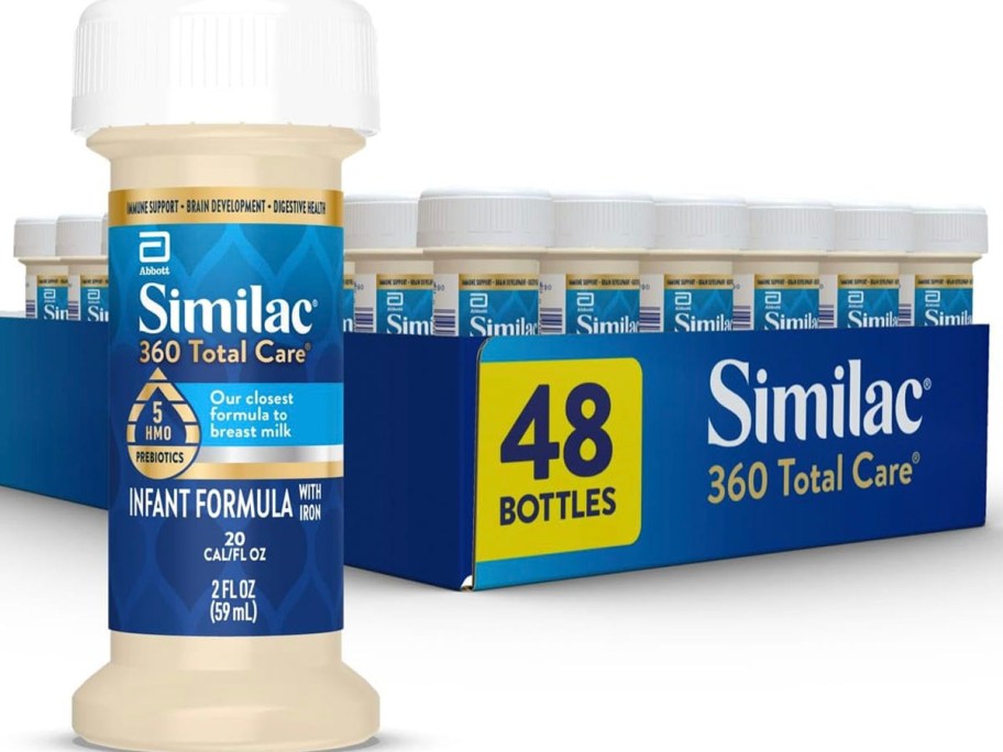 similac total care infant bottle with 48 pack behind it 