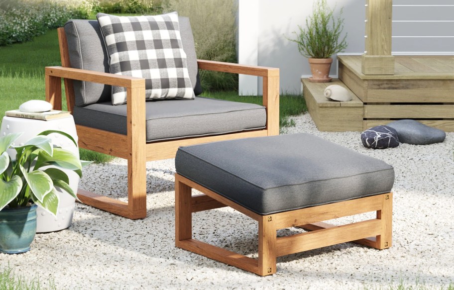 wood patio chair and ottoman set with grey cushions