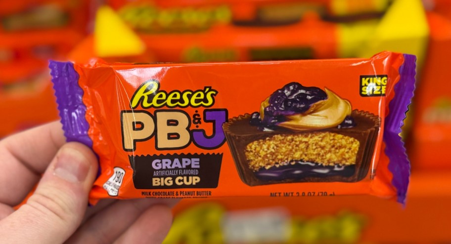 Reese's PBand J bars in persons hands in grape