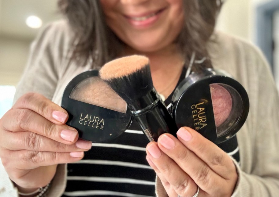woman holding foundation blush and brush
