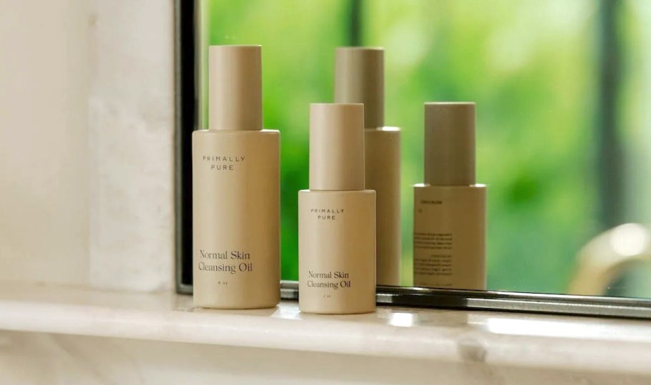 primally pure cleansing oil bottles on counter