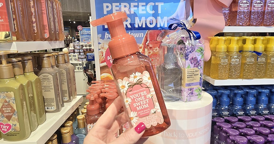 hand holding up a pink Bath & Body Works Mother's Day Hand Soap
