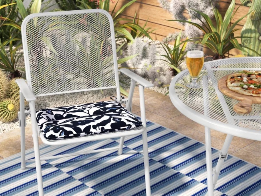 Room Essentials 16"x16" Patio Seat Cushion on white patio chair