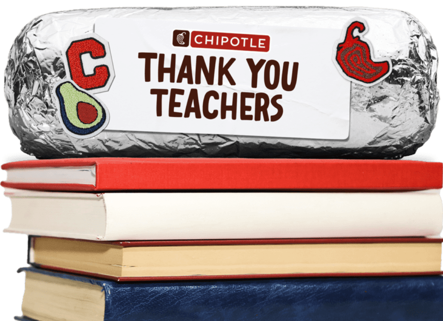 foil-wrapped burrito on a stack of books