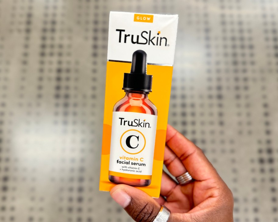 hand holding truskin in box