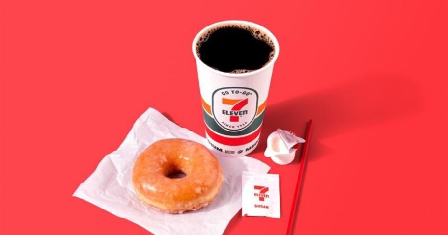 coffee and a doughnut on a red background