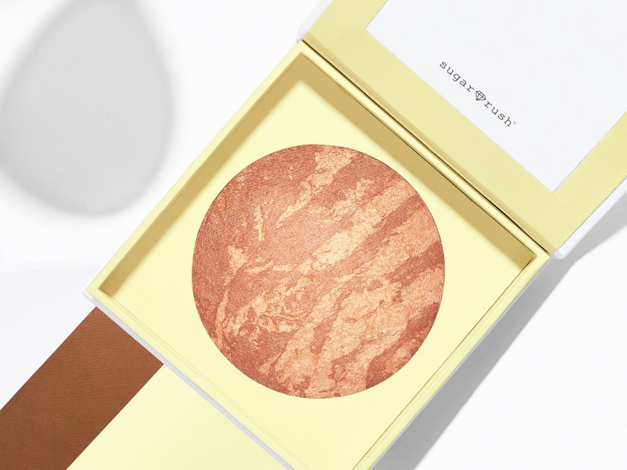 opened tarte bronzer in yellow packaging