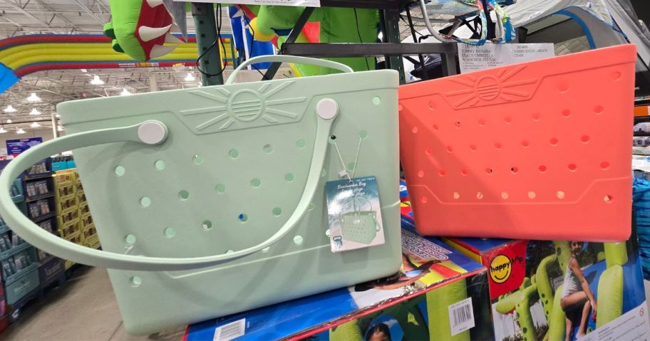 a green and an orange Beachcomber Beach Bag in store