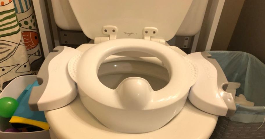 OXO Tot 2-in-1 Go Potty seat on toilet in bathroom