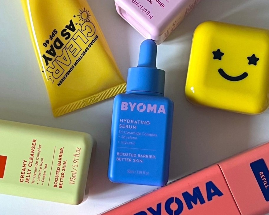 many skincare products in a pile