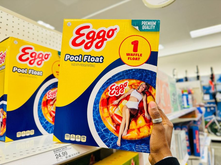 hand holding eggo pool float