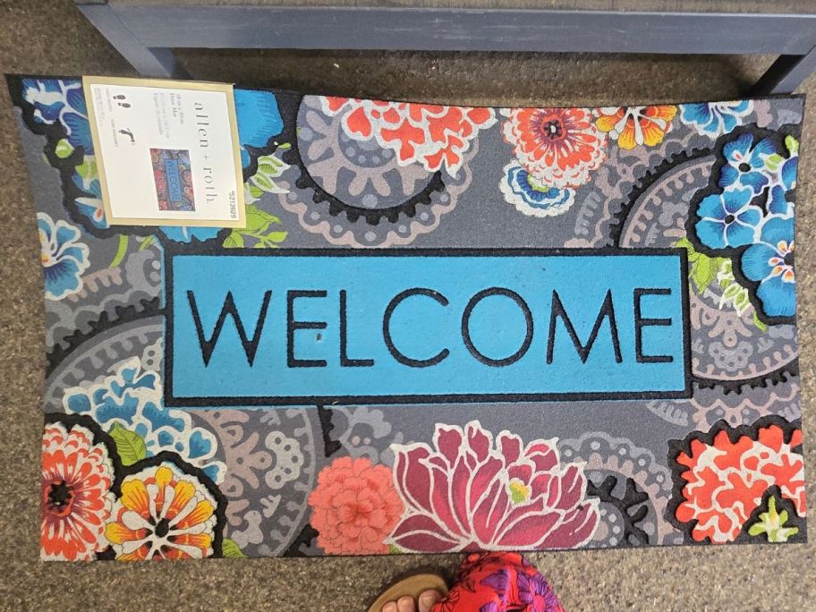 An Allen + Roth Natural Coir Door Mat - Welcome Floral