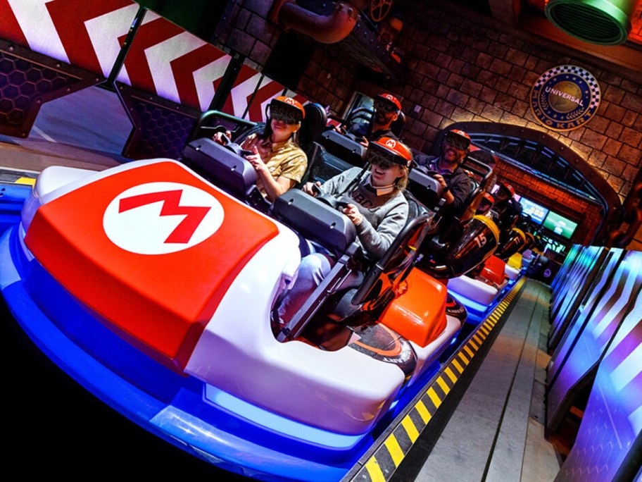 mario kart ride with family sitting in it