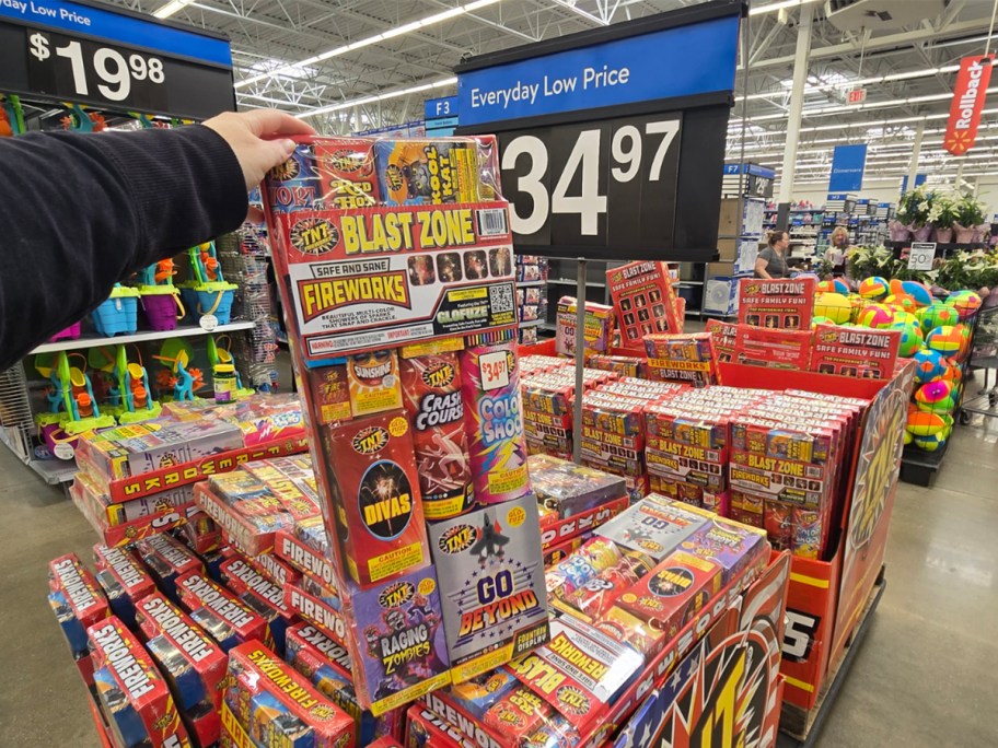 hand holding tnt fireworks box 