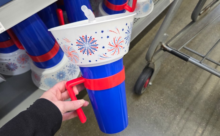 hand holding patriotic snack tumbler