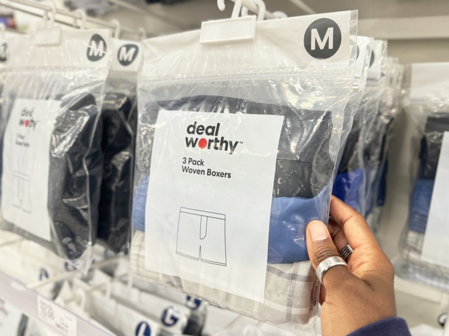 hand holding pack of Dealworthy Men's Boxers at Target