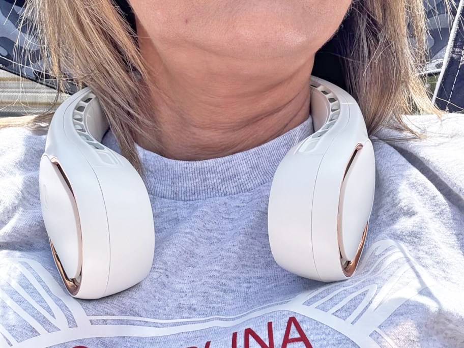 woman with a white neck fan around her neck
