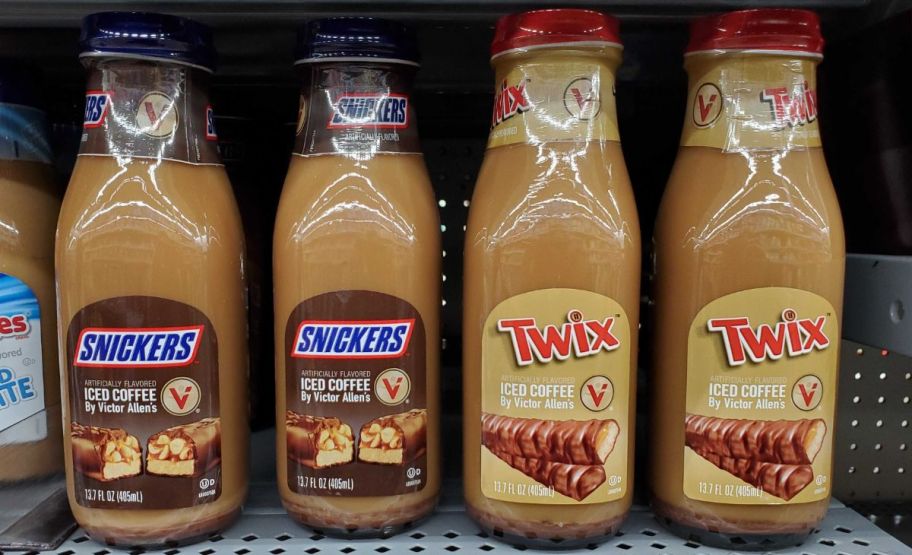 4 bottles of victor allens iced coffee in bottles on a store shelf