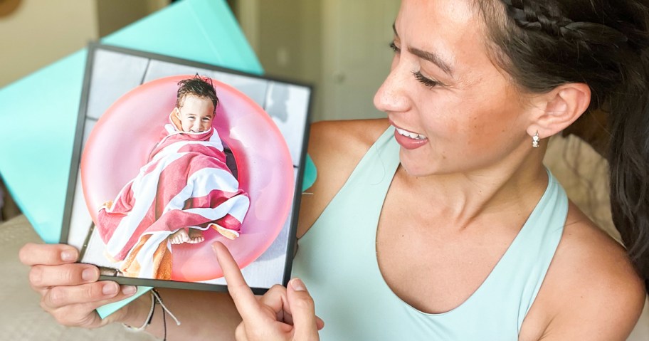 Woman looking at her TilePix Print